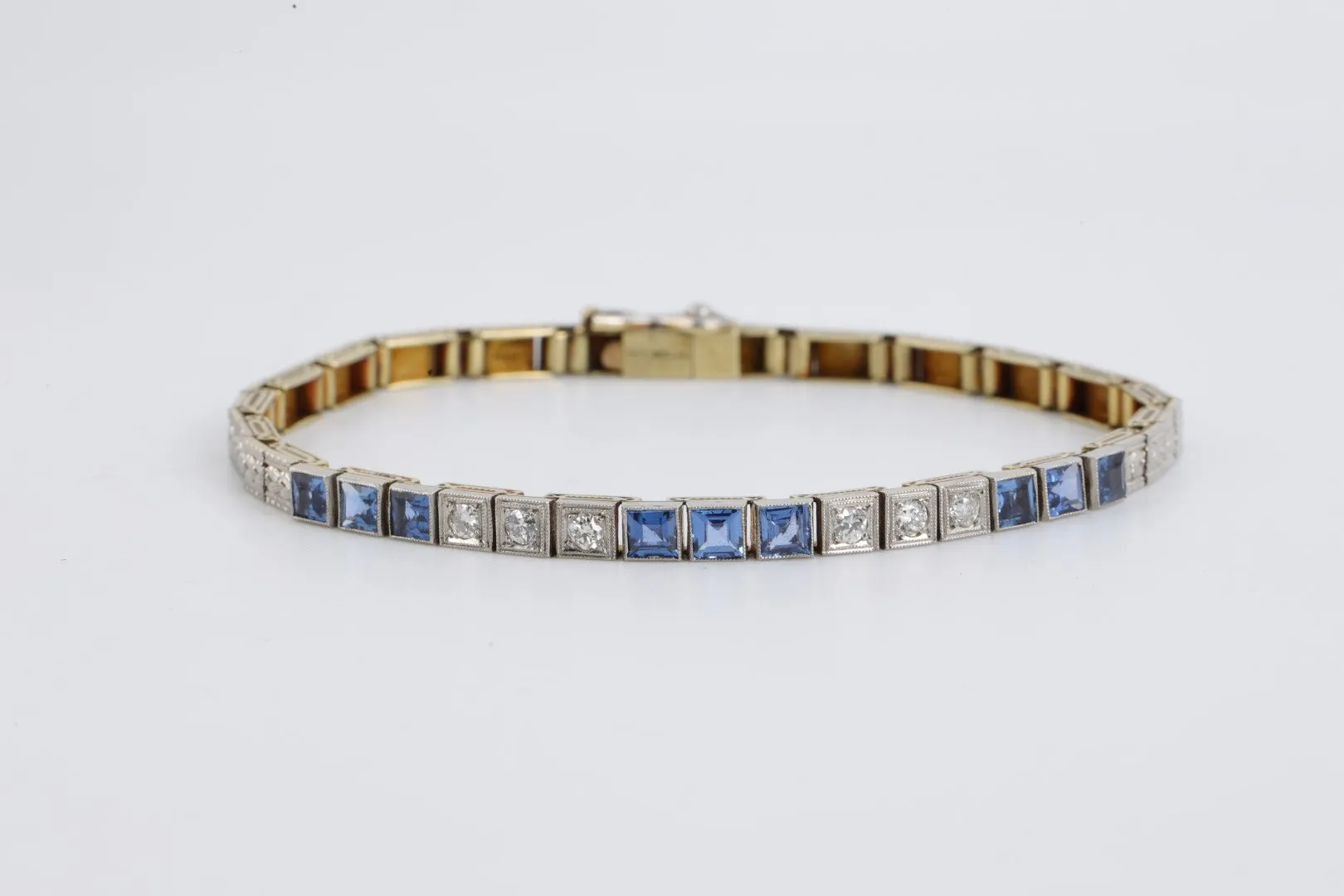 14" 14k Two-Tone Gold 2.67tcw Sapphire 0.30tcw Diamond Bracelet (14.42g.)